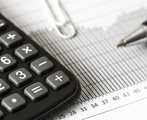 a pen, paper, and a calculator